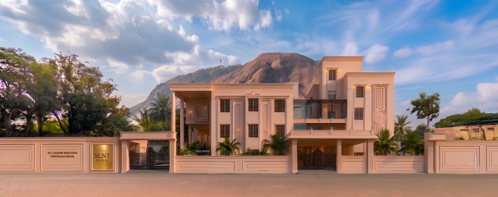 SLNT Mahal front elevation with Thiruparankundram Hill rising behind it